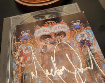 GESIGNEERDE/GETEKENDE Michael Jackson Dangerous-album-cd: beschrijving lezen!