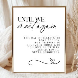 Könnte beinhalten: Ein gerahmter Druck mit den Worten "UNTIL WE meet again" in eleganter Schrift. Der Text darunter lautet: "THIS DAY IS FILLED WITH LOVE AND JOY. BUT WE PAUSE TO REMEMBER THOSE WHO COULDN'T BE WITH US. ALWAYS LOVED. NEVER FORGOTTEN."