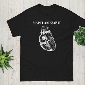 May include: Black t-shirt with a white anatomical heart illustration and the text "MAP IT AND ZAP IT" printed on the front.