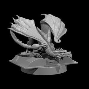 May include: A grey monochromatic figurine of a dragon with large, textured wings and a long tail, positioned in a crouching stance atop an open book. The creature features detailed scales and sharp claws, resting on a circular base.