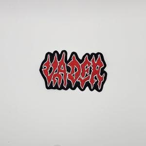 Vader röd och vit logotyp formad kant broderad lapp
