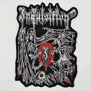 May include: A black embroidered patch featuring the word Inquisition in white gothic lettering at the top. The design includes a white skeletal figure with wings, a central red circular element, and a white eye graphic on a black background.