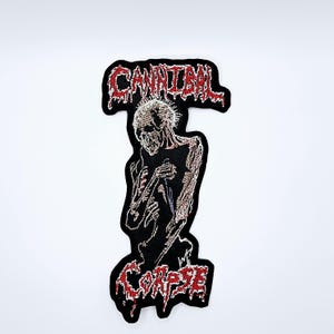 Parche bordado con borde en forma de tumba de cadáveres caníbales y mutilados