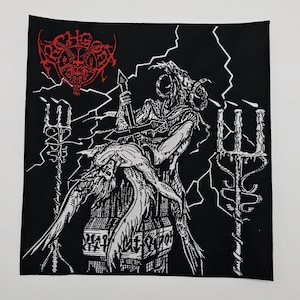 May include: Black square patch with a white and red graphic. The graphic depicts a horned figure holding a cross, with lightning bolts and a trident. The top of the patch has red text. The patch is likely for a band or heavy metal enthusiast.