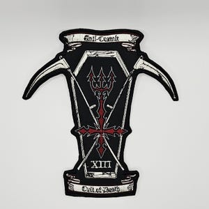 May include: A black embroidered patch featuring a white coffin outline, two crossed scythes, and a red trident symbol. The text Anti-Cosmic is at the top and Cult of Death is at the bottom, with the Roman numeral XIII centered near the base.