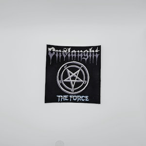 May include: Black square patch with the band name "Onslaught" in a gothic font above a white pentagram inside a circle. The text "THE FORCE" is below the circle, all in white.