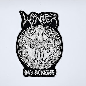 May include: A trio of speckled ceramic mugs in cream, light grey, and dark grey. Each mug has a minimalist design and a matte finish. Ideal for tea or coffee, these mugs offer a simple, modern aesthetic.