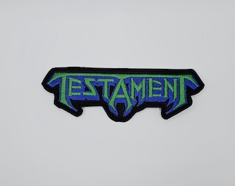 Parche bordado con borde en forma de logotipo verde y azul del Testamento