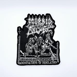 Morbid Angel Abominations of Desolation-vormige geborduurde patch aan de rand