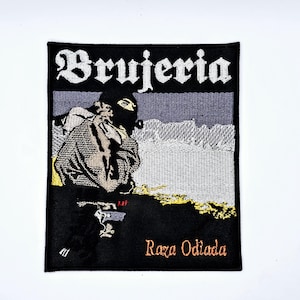 May include: Black rectangular patch with the word "Brujeria" in white gothic font. The patch features a figure in a black mask and a gun, with the words "Raza Odiada" in orange.