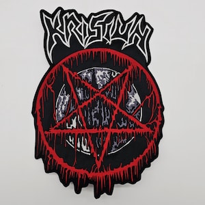 May include: Black patch with the word "KRISTUM" in white, stylized lettering above a red-outlined pentagram. The pentagram is dripping with red, and the background is a gray and white design.