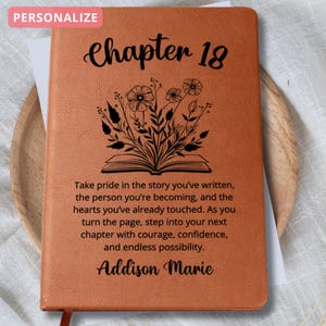 May include: A personalized, orange-brown journal with the text "Chapter 18" and a floral design. The journal includes the name "Addison Marie" and an inspirational quote about embracing new chapters.