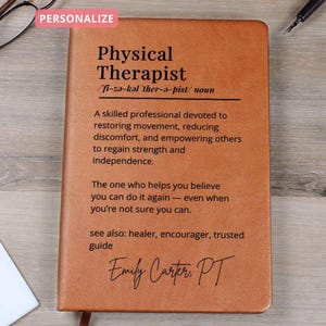 May include: A brown leather-bound notebook with the words "Physical Therapist" and a definition printed on the cover. The notebook includes the name "Emily Carter, PT" and the word "Personalize" in a pink rectangle.
