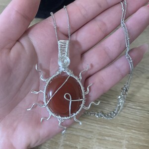 Silver carnelian sun pendant