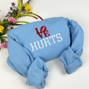 Love Hurts Embroidered Sweatshirt - Philadelphia Football Fan