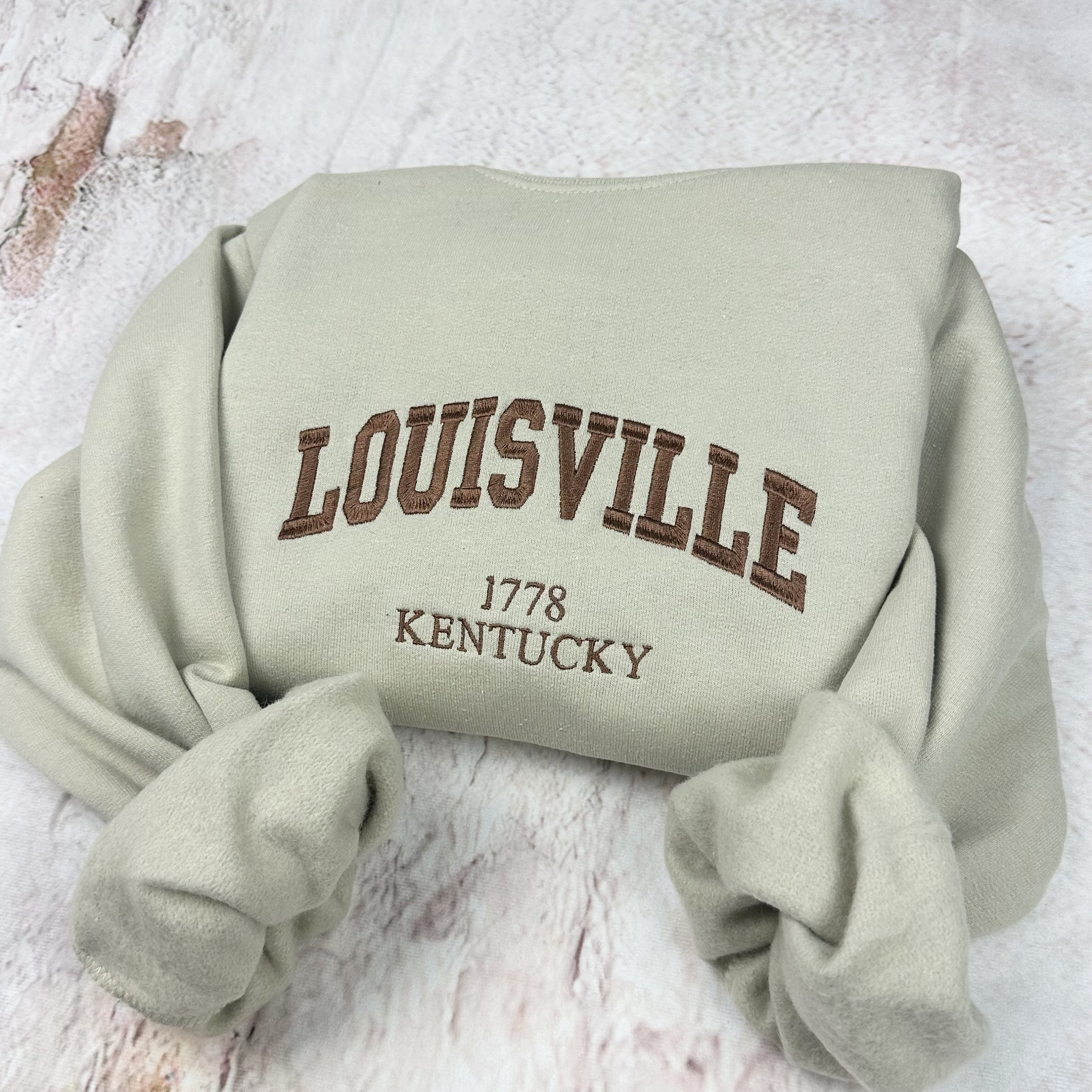 CustomCat Louisville Cardinals Vintage NCAA Football Crewneck Sweatshirt White / L