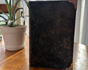 Hand bound black journal or witch grimoire made with faux leather vinyl