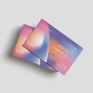 May include: Two business cards with a colorful gradient design in shades of pink, orange, blue, and purple. The cards display the name "JASON HARRIS" and contact information for a Certified Wellness Coach. The words "Wellness Coach" and "Holistic Health" are also visible.