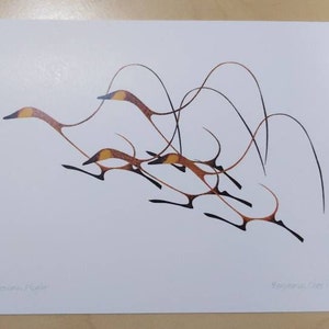 May include: A white rectangular print featuring a stylized illustration of four birds in flight. The birds are rendered in shades of orange, brown, and black with long, sweeping lines. The text "Avian Flight" and "Benjamin Chee Chee" is visible.