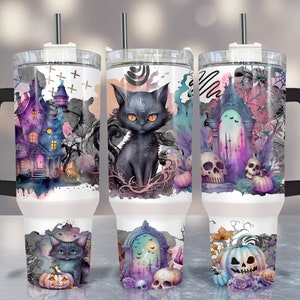 May include: Three stainless steel tumblers with black handles and lids. Each tumbler features a different Halloween-themed design: a haunted house, a black cat, and a spooky archway with skulls and pumpkins.