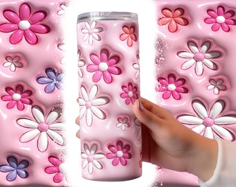 May include: A pink stainless steel tumbler with a 3D daisy pattern. The daisies are white, pink, and purple.