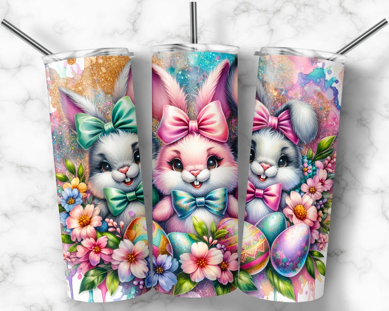 May include: Three stainless steel tumblers with a spring-themed design. Each tumbler features a different pastel-colored bunny with a bow and surrounded by colorful flowers. The tumblers are perfect for spring celebrations.