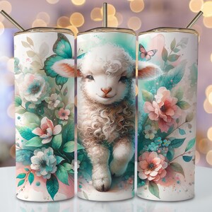 May include: Three stainless steel tumblers with a white background and a watercolor design of a cute lamb with blue and pink flowers.