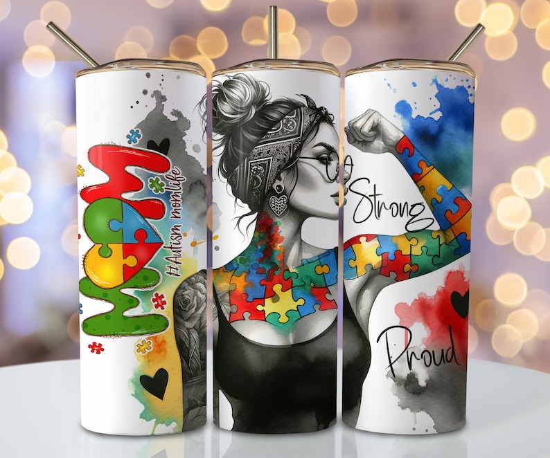 May include: Three stainless steel tumblers with a white background and colorful designs. The first tumbler features the word "MOM" with a puzzle piece heart and the text "#Autism momlife". The second tumbler features a woman with a puzzle piece tattoo and glasses. The third tumbler features a woman's arm with a puzzle piece tattoo and the text "So Strong" and "Proud".