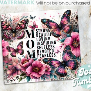 May include: A white background with pink flowers and butterflies. The word "MOM" is in large black letters with the words "Strong, Beautiful, Loving, Inspiring, Selfless, Devoted, Fearless" written in black letters below.