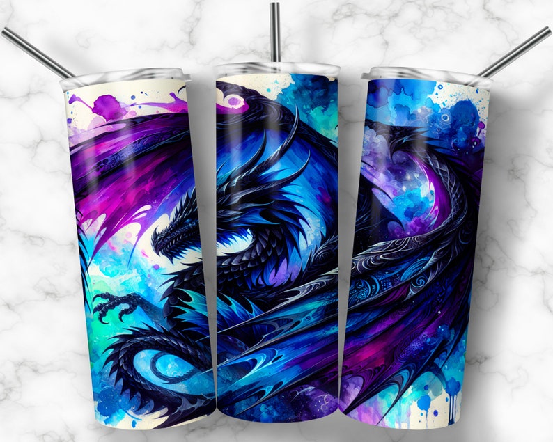 May include: Three stainless steel tumblers with a black dragon design on a watercolor background. The dragon is surrounded by blue, purple, and pink watercolor splatters.