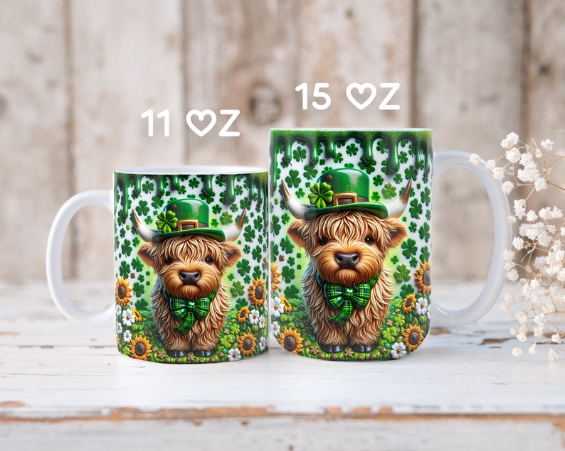 May include: Two white ceramic mugs with a green shamrock and sunflower design. The mugs feature a cartoon Highland cow wearing a green leprechaun hat. The mugs are available in 11 oz and 15 oz sizes.