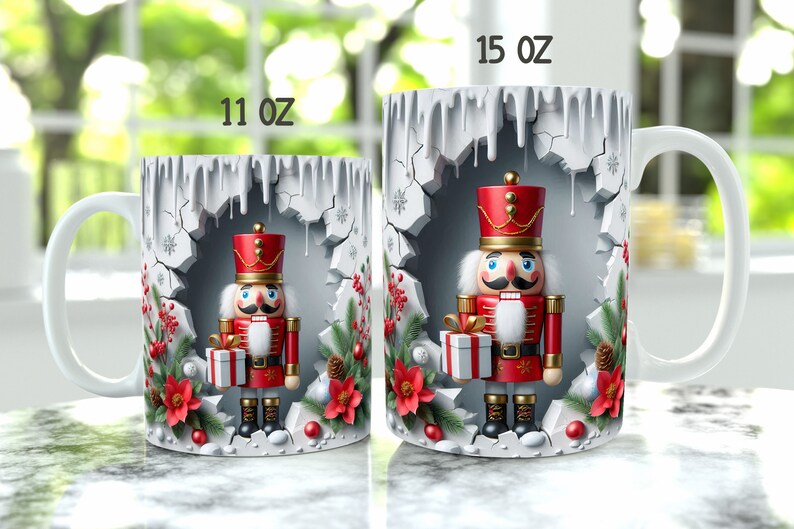 May include: Two white ceramic mugs featuring a Christmas nutcracker design. The mugs are 11 oz and 15 oz. The nutcracker is holding a gift and is surrounded by holly and snowflakes.