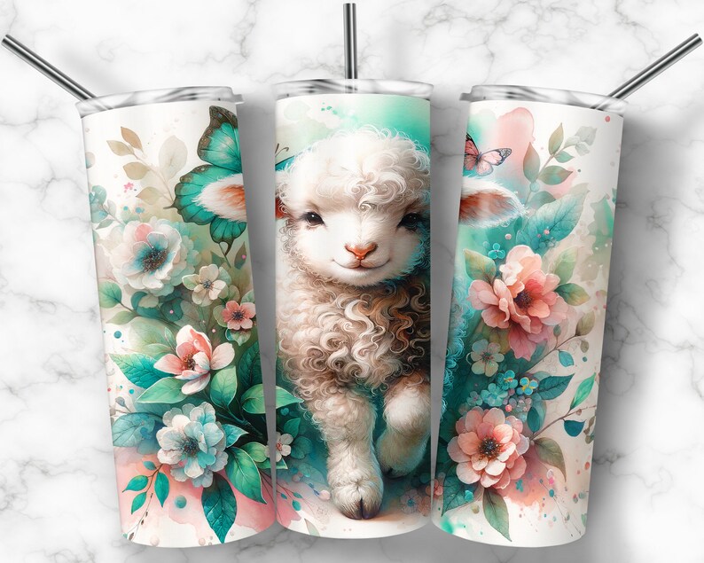 May include: A white stainless steel tumbler with a watercolor design of a cute lamb with curly fur, surrounded by pink and blue flowers and butterflies. The background is a light blue watercolor wash.