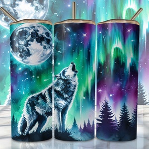 May include: Three stainless steel tumblers with different designs. The first tumbler features a wolf howling at the moon with a starry night sky background. The second tumbler features a wolf howling at the aurora borealis with a starry night sky background. The third tumbler features the aurora borealis with a starry night sky background.