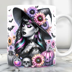 May include: White ceramic mug featuring a colourful illustration of a witch wearing a black hat adorned with sunflowers, bats and a pumpkin. The witch has long black hair with pink and blue streaks, and she is wearing a black choker with a spiderweb pendant.