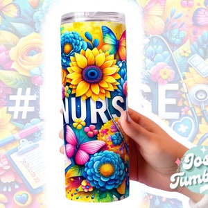 May include: A stainless steel tumbler with a colorful floral design and the word "#NURSE" printed on it. The design includes butterflies, sunflowers, and other flowers in shades of pink, blue, yellow, and green.
