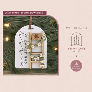 May include: A white arched wooden Christmas ornament featuring a laser-cut ladder design with a sign reading OUR CREW 2025. The ornament includes small circular and bone-shaped wooden tags with letters, hanging from a brown leather cord.