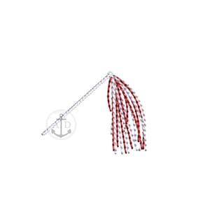 May include: A white and red tassel with a silver chain attached to a silver anchor charm.