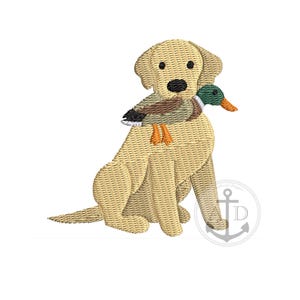 May include: Embroidered design of a golden retriever dog sitting with a duck in its mouth. The dog is light tan with black eyes and nose. The duck has green, brown, and orange details. The design is on a white background.