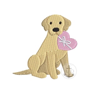 May include: A golden retriever dog embroidery design holding a pink heart-shaped gift with a white bow. The dog is sitting, with a textured, woven appearance. The design is on a white background.