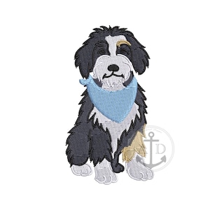 May include: An embroidered design of a seated dog with black and white fur, a light blue bandana, and a gold accent. The dog is facing forward, with a friendly expression. The design is likely for apparel or crafts.