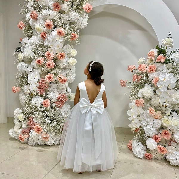 Elegant full length white flower girl dress with big bow and pearl belt