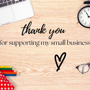 May include: A wooden desk with a laptop, a red and white polka dot pencil case with colored pencils, a black alarm clock, a pair of glasses, and the text "thank you for supporting my small business" with a heart drawn below.
