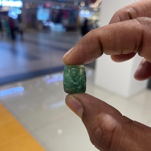 Hand Carved Emerald Ganesha Pendant: Zambian Gemstone Sculpture