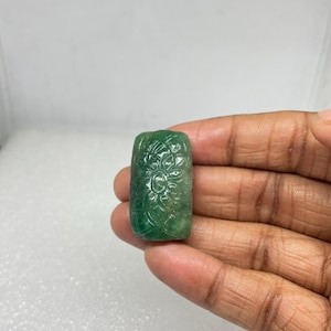 Hand Carved Zambian Emerald: 80 Carat Flower Cabochon Pendant