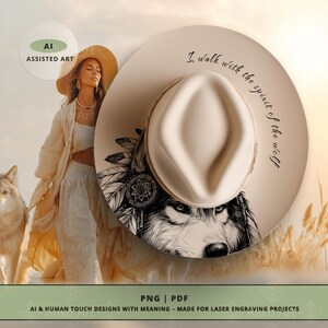 May include: A cream-coloured fedora hat with a wolf illustration and the text "I walk with the spirit of the wolf." The hat features a detailed black and white drawing of a wolf's face and feathers. The image also includes a woman and a wolf.