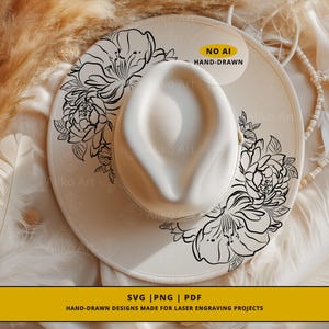 May include: A cream-colored fedora hat with a wide brim, adorned with black floral line art. The hat features the text "NO AI HAND-DRAWN" on a circular sticker. The bottom of the image has the text "SVG | PNG | PDF".