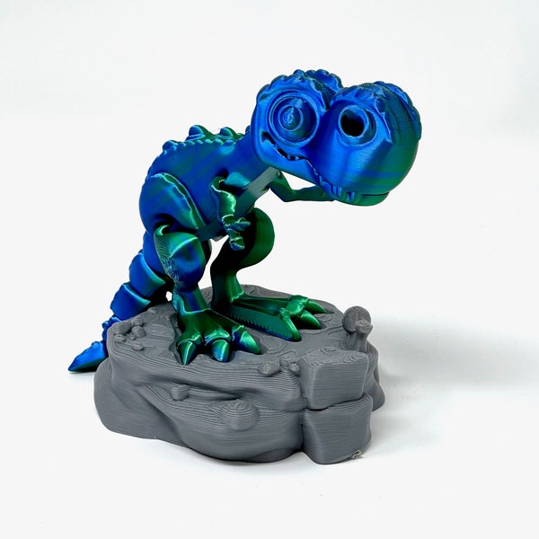 Niedlicher T-Rex Dinosaurier in Magic Blau-Grün. Ideal auch als Geschenk!