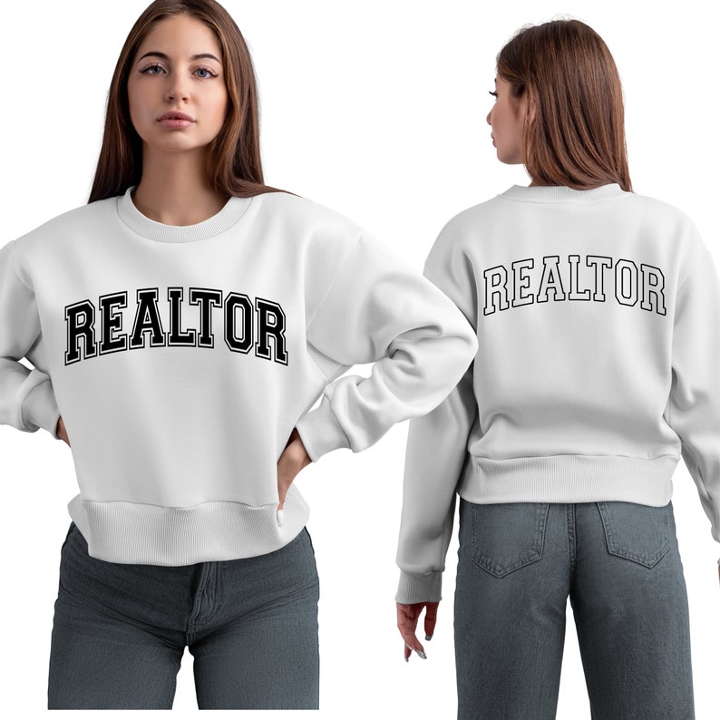 Peut inclure: Sweat-shirt blanc avec le mot "REALTOR" imprim&eacute; en noir sur le devant et le dos.