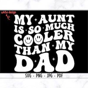 May include: A black graphic design with white text that reads "MY AUNT IS SO MUCH COOLER THAN MY DAD". The design includes two smiley faces and star accents. The bottom of the design includes the text "SVG - PNG - JPG - PDF".